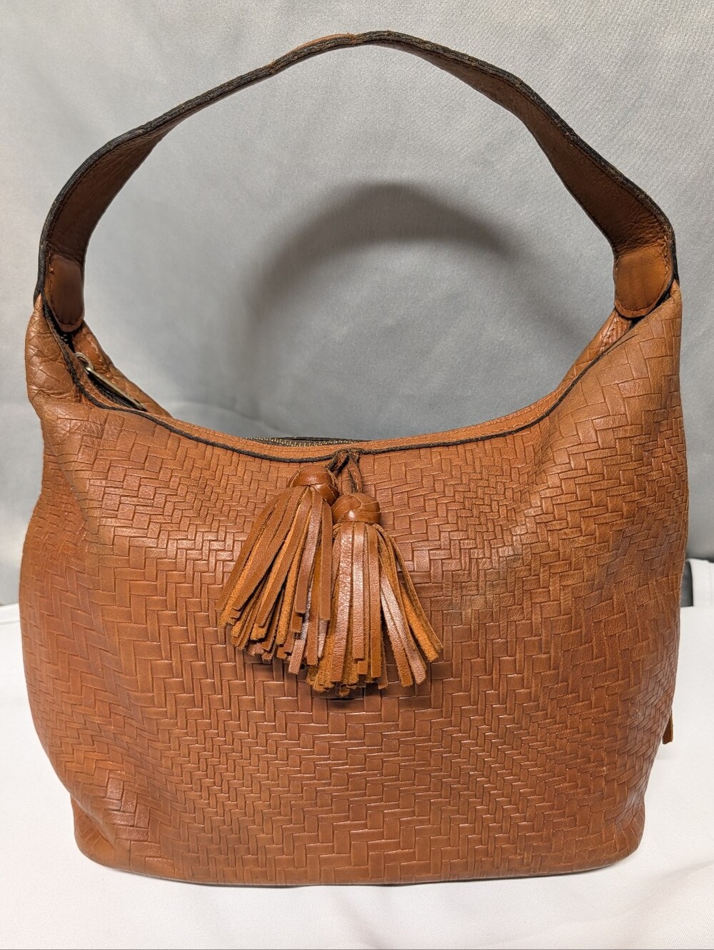 Patricia Nash Woven Tassel Shoulder Hobo in Cognac